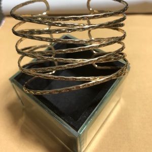 Gold tone cuff bracelet